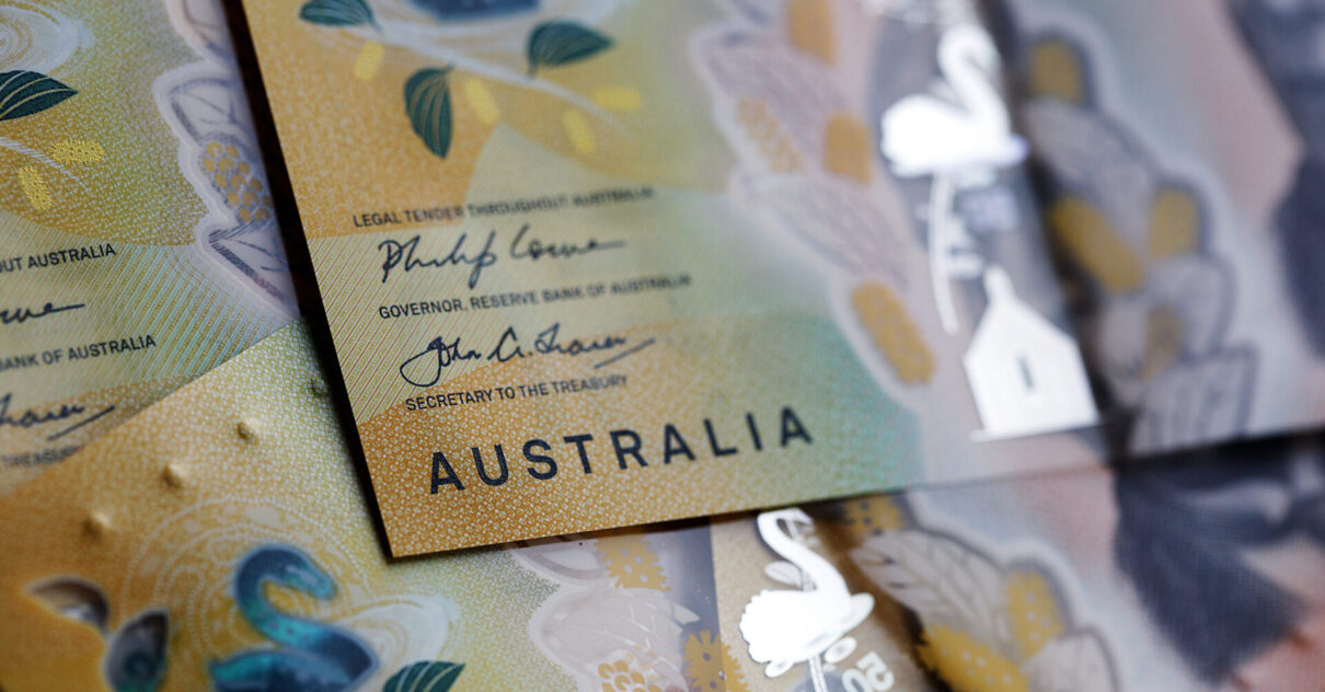 Australian fifty dollar bill. The new issue is designed to deter counterfeiting, the note is polymer and water resistant with a clear holographic strip.