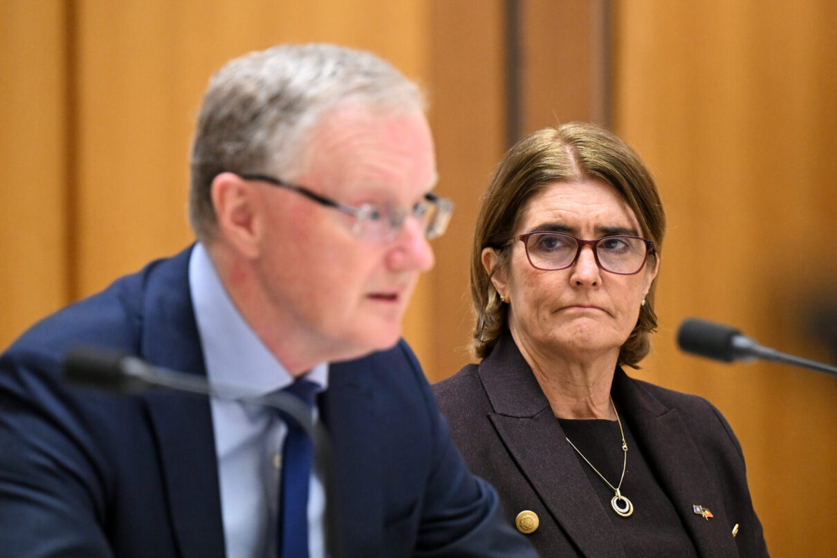 Incoming Reserve Bank of Australia Governor Michele Bullock (right) listens to Reserve Bank of Australia Governor Philip Lowe speak during a House of Representatives Standing Committee on Economics hearing at Parliament House in Canberra, Friday, August 11, 2023
