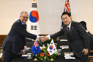 Australian Prime Minister Anthony Albanese (left) shakes hands with the President of the Republic of Korea Yoon Seok-youl ahead of the Nato Leaders’ Summit in Madrid, Spain, Tuesday, June 28, 2022. Australian Prime Minister Anthony Albanese will join leaders of Japan, South Korea, and New Zealand for a Nato Leaders’ Summit in Spain, before flying to France in a bid to repair the relationship with French President Emmanuel Macron. (AAP Image/Lukas Coch) NO ARCHIVING