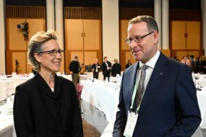 Australian Chamber of Commerce and Industry (ACCI) CEO Andrew McKellar (right) and ACTU Secretary Sally McManus attend the Jobs and Skills Summit at Parliament House in Canberra, Thursday, September 1, 2022