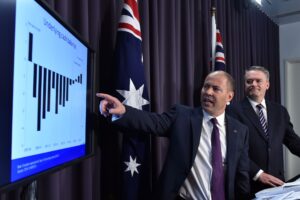 Treasurer Josh Frydenberg and Minister for Finance Mathias Cormann speak during a press conference as they hand down the Mid-Year Economic and Fiscal Outlook 2018/19 at Parliament House in Canberra, Monday, December 17, 2018