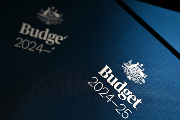 A copy of the 2024/25 Budget paper is seen inside the Budget lockup at Parliament House in Canberra, Tuesday, May 14, 2024. Australian Treasurer Jim Chalmers will today hand down the 2024/25 Federal Budget. (AAP Image/Lukas Coch) NO ARCHIVING