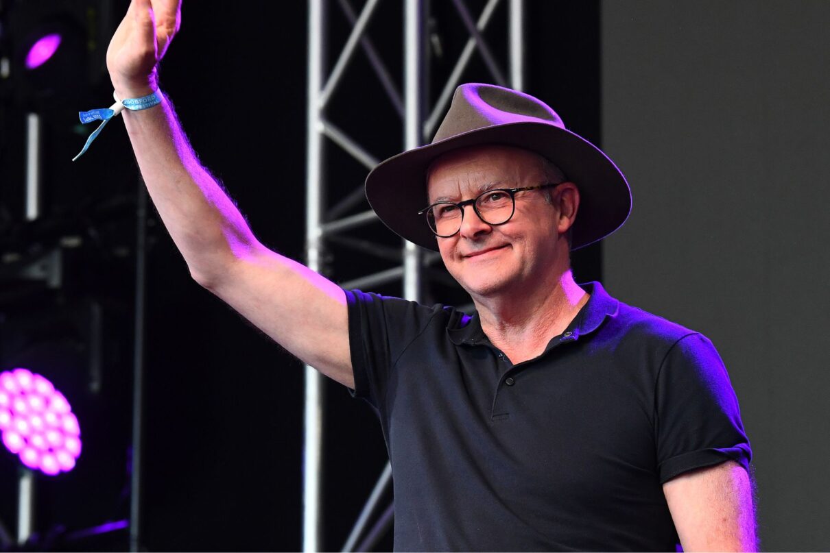 Prime Minister Anthony Albanese waves after delivering a speech during the Woodford Folk Festival in Woodford, 72km north of Brisbane, Wednesday, December 28, 2022.