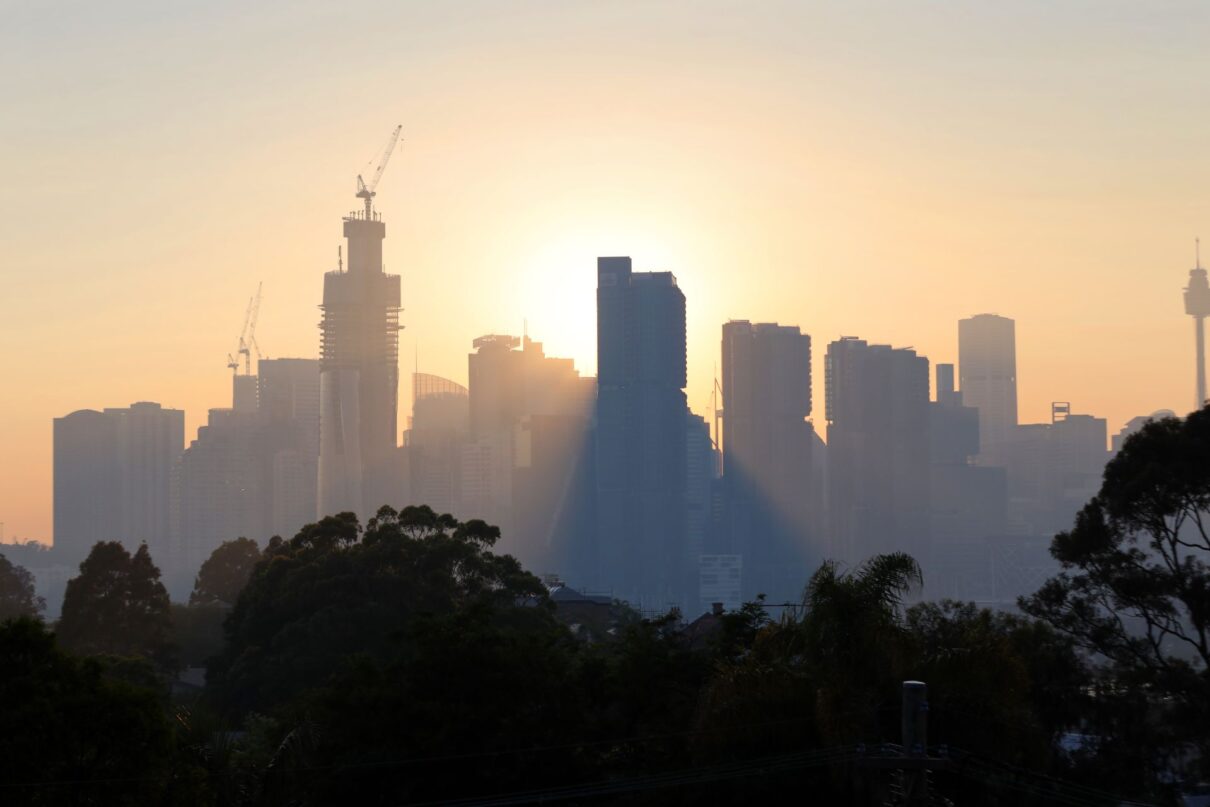 The Sydney skyline is seen from the suburb of Balmain through smoke from bushfires as the sun rises over the CBD in Sydney, Tuesday, November 12, 2019. Parts of NSW face catastrophic bushfire danger on Tuesday, with residents in bushland areas told to leave early rather than wait for fresh fires to start.