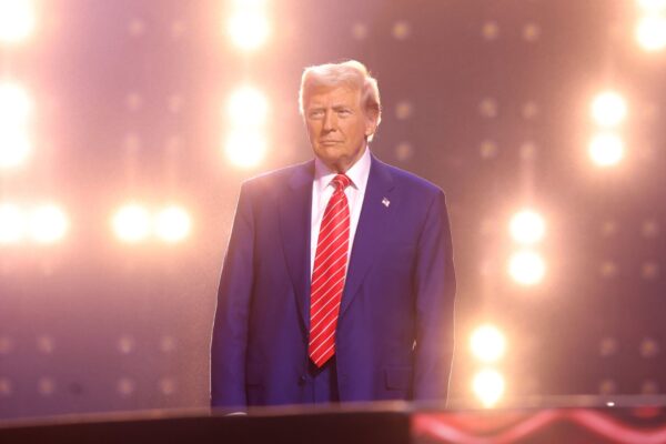 President-elect of the United States Donald Trump speaking with attendees at the 2024 AmericaFest at the Phoenix Convention Center in Phoenix, Arizona. (CC BY-SA 2.0, https://www.flickr.com/photos/gageskidmore/54234409507/in/photostream/)