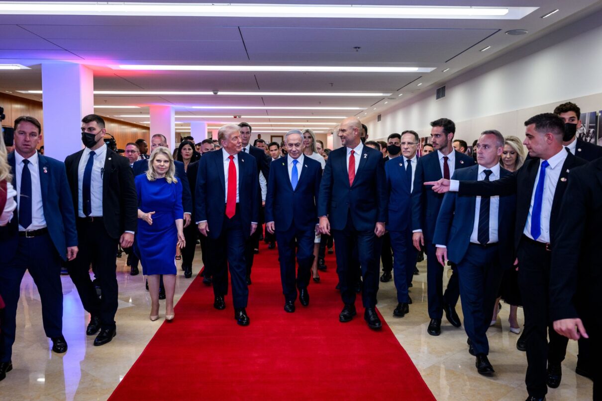 President Donald Trump walks with Israeli Prime Minister Benjamin Netanyahu at the Knesset in Jerusalem, Israel, Monday, October 13, 2025, during a visit to celebrate the U.S.-brokered ceasefire and hostage release agreement between Israel and Hamas. (Official White House Photo by Daniel Torok)