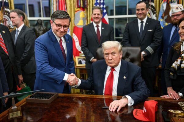 President Donald Trump and Speaker of the House Mike Johnson shake hands after signing the funding bill that reopens the government, Wednesday, November 12, 2025, in the Oval Office. (Official White House Photo by Daniel Torok)