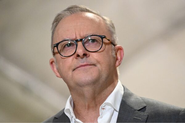 Prime Minister Anthony Albanese speaks to media during a visit to State Library Station in Melbourne, Sunday, November 16, 2025.