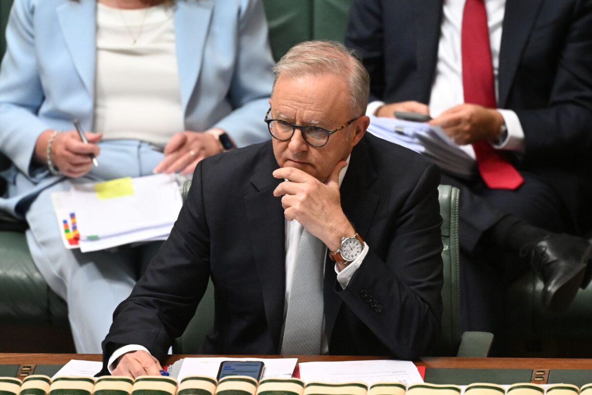 Australian Prime Minister Anthony Albanese reacts during Question Time in the House of Representatives at Parliament House in Canberra, Tuesday, November 25, 2025