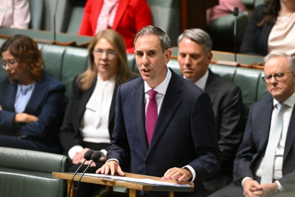 Australian Treasurer Jim Chalmers delivers the 2026-27 Federal Budget in the House of Representatives at Parliament House in Canberra, Tuesday, May 12, 2026.