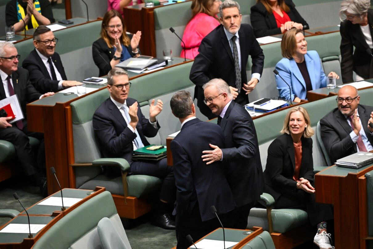 Australian Treasurer Jim Chamers and Australian Prime Minister Anthony Albanese leave after the passing of the Tax Reform Bill in the House of Representatives at Parliament House in Canberra, Thursday, June 25, 2026.