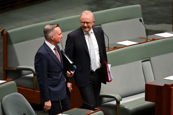 Australian Prime Minister Anthony Albanese and Australian Energy Minister Chris Bowen arrive during Question Time in the House of Representatives at Parliament House in Canberra, Wednesday, April 1, 2026.